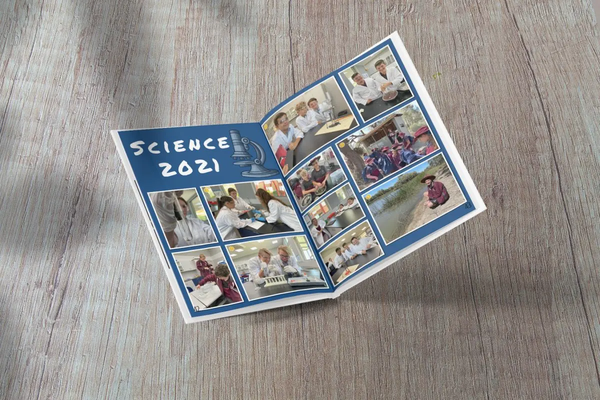 Open yearbook showing a science 2021 photo spread
